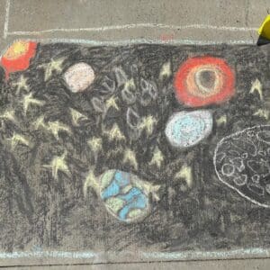 A Drawing in Chalk With Color on a Surface