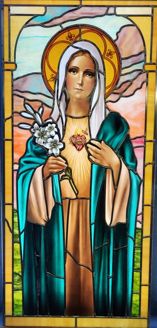 Stained glass window depicting the Virgin Mary.