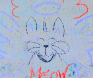 Chalk drawing of a cat saying "meow"