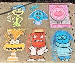 Inside Out characters drawn with chalk.